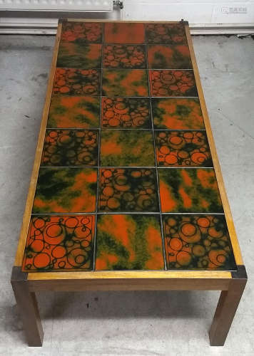 A 20th Century coffee table, wooden frame with tiled top, 146 cm wide x 66 cm deep x 42 cm high