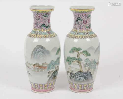 A pair of 20th Century Chinese famille rose ovoid vases, enamel lake scenes, character marks to