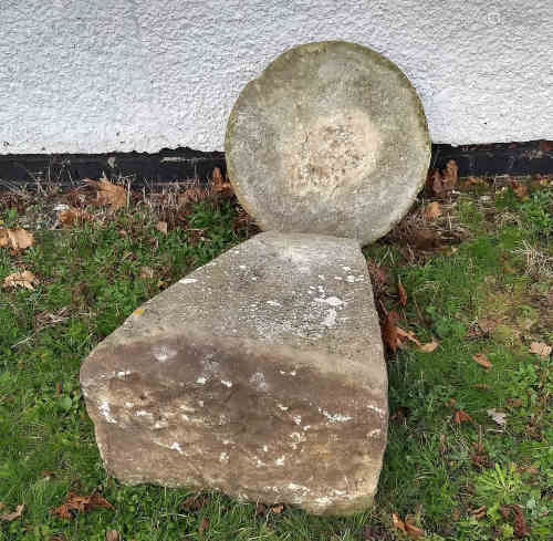 A 19th Century staddle stone, squared tapered body, circular top, 78 cm high
