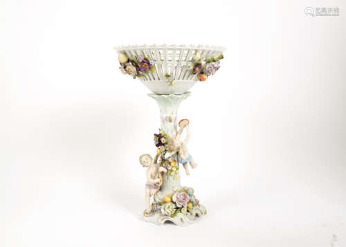 A late 19th Century Coburg Dresden porcelain comport, floral and fruit encrusted, naturalistic