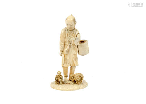A Meiji period Japanese carved ivory figure of a farmer carrying a basket and scythe, incised