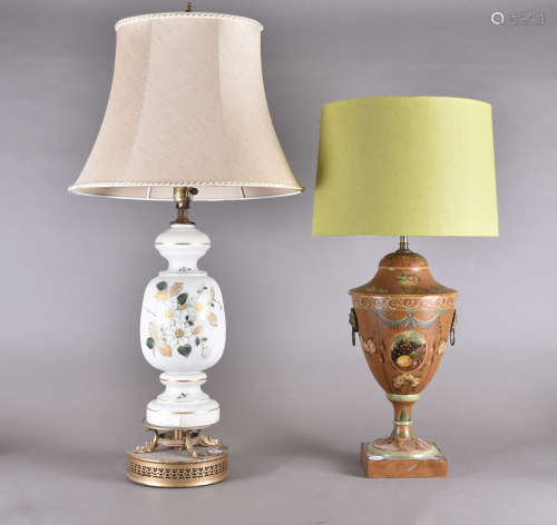 An early 20th Century opaque white glass table lamp, baluster form, painted and applied gilt