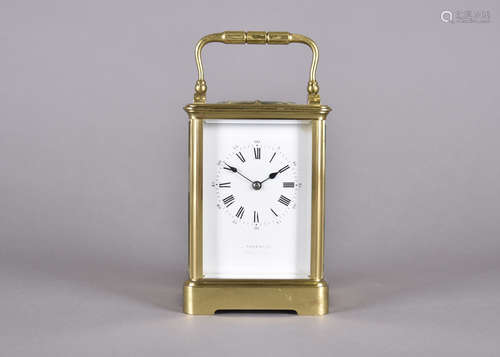 An Edwardian brass repeater carriage clock, by Schwarck, brass case, white enamel face, Roman