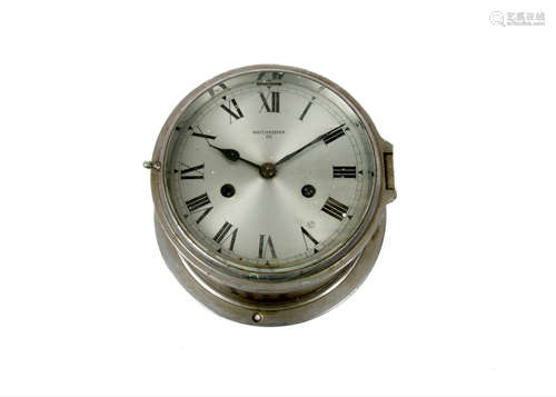 A chromed Watchkeeper bulkhead ship's clock, Roman numeral, 20 cm diameter x 12 cm deep