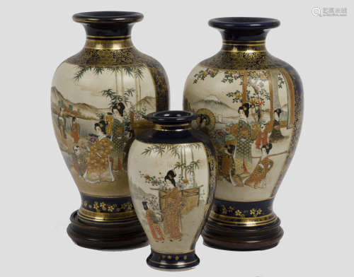 Three early 20th century Imari vases, each with two panels depicting Asian figures within a