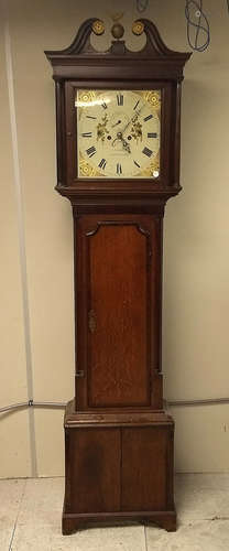 A 19th Century oak and mahogany longcase clock by J. Jones of Carnarvon, eight day movement,