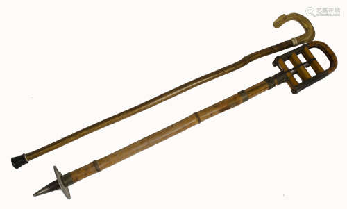 A 19th century French bamboo shooting stick, with metal mounts, the articulated top raised above a