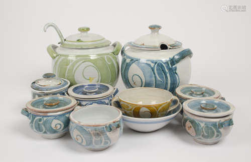 A group of Aldermaston Pottery items, including a pair of tureens with covers, one decorated in