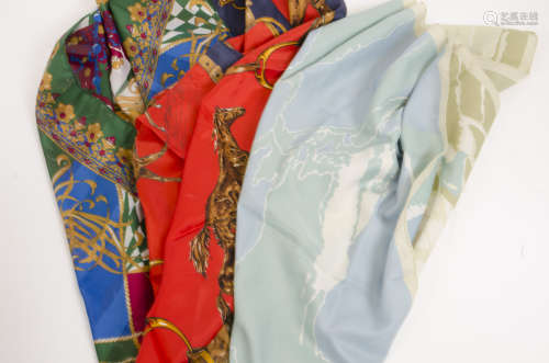 A large selection of scarves, silk, cotton, wool and acetate examples in a variety of designs and