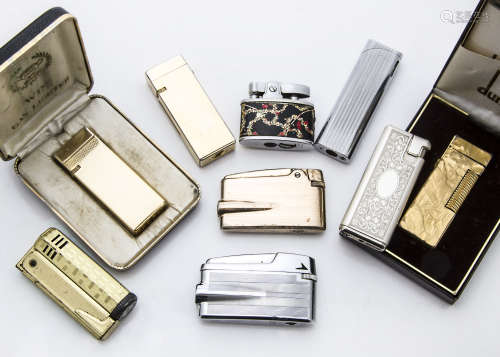 A group of nine 1960s and later cigarette lighters, including a 1970s gilt Dunhill example in a box,