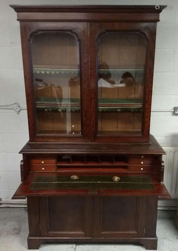 A 19th Century mahogany secretaire bookcase, upper section with two panel glazed doors and