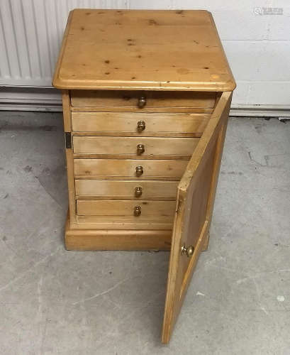 A 19th Century waxed pine collector's cabinet, single door reveealing six drawers, 57 cm x 59 cm x