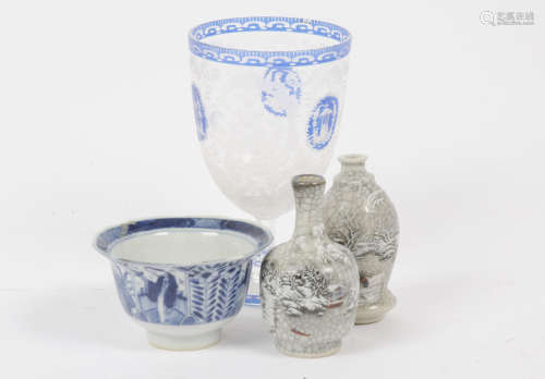 A Chinese porcelain blue and white, figure and floral decoration, character marks to base, 5 cm