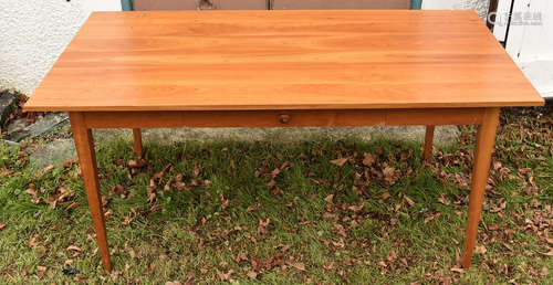 A modern Shaker pine kitchen table, central drawer, four tapered supports, Shaker label to drawer,