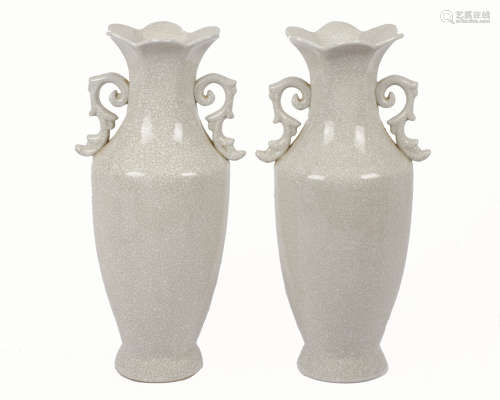 A pair of 20th Century Chinese porcelain twin-handled baluster vases, crackle glaze, flared petal