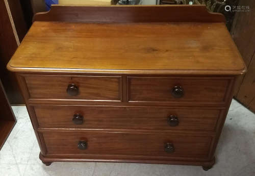 A 19th Century mahogany chest-of-drawers, two short over two long drawers, rounded corners,