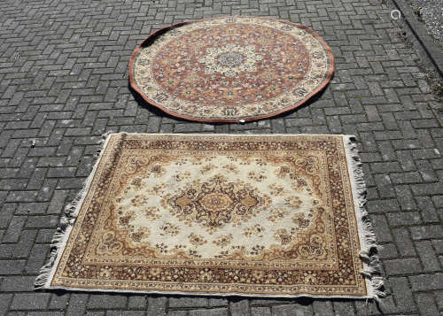 A Persian style woollen rug, gold and brown medallion on ivory field, scroll border, 167 cm x 120
