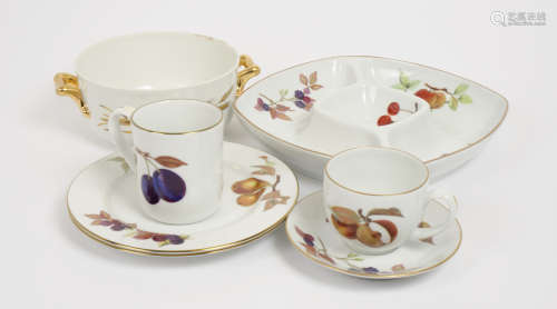 A large quantity of Royal Worcester 'Evesham' pattern table and ovenware, including dinner plates,