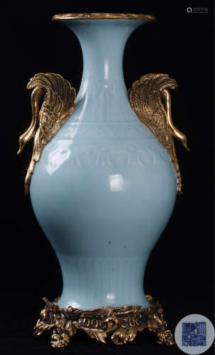 A CELADON OLIVE SHAPED VASE WITH METAL DECORATION