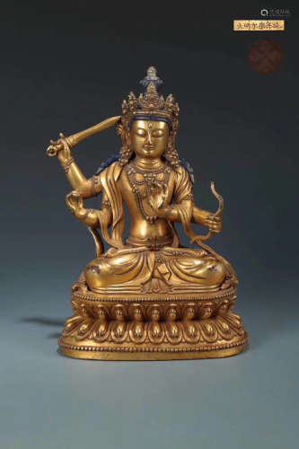 A GILT BRONZE WENSHU BUDDHA STATUE