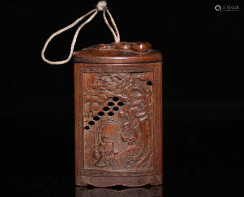 A BAMBOO CARVED HOLLOW PATTERN PENDANT