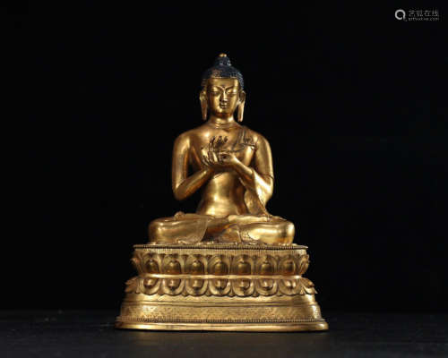 A GILT BRONZE LOTUS SITTING BUDDHA STUATE