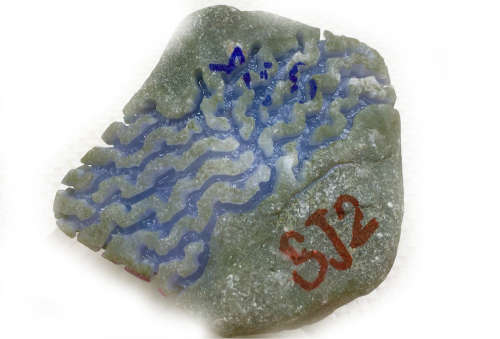 A BURMESE VIOLET JADEITE STONE, A CLASS