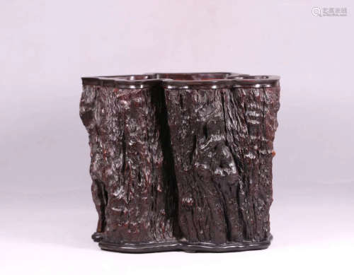 A RED WOOD CARVED BRUSH POT