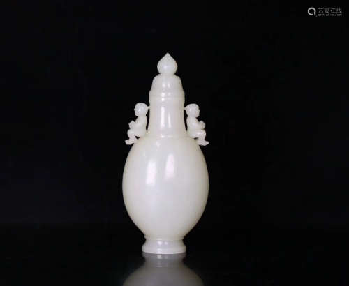 A HETIAN JADE CARVED DOUBLE-EAR VASE