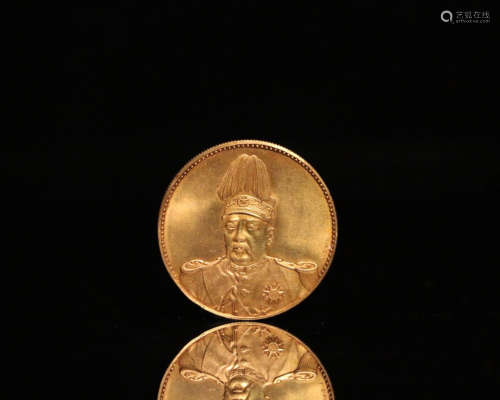 A PURE GOLD REPUBLIC OF CHINA COMMEMORATIVE COIN