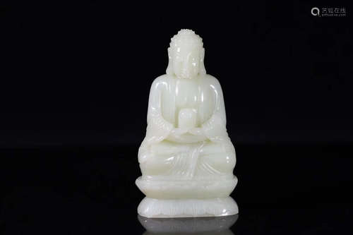 AN OLD HETIAN JADE SAKYAMUNI STATUE