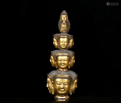 TIEBETAN, A GILT BRONZE ELEVEN FACE BUDDHA HEAD STATUE. QING DYNASTY