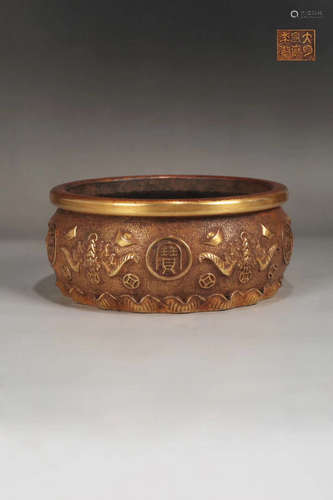 A GILT BRONZE BAT PATTERN ALMS BOWL