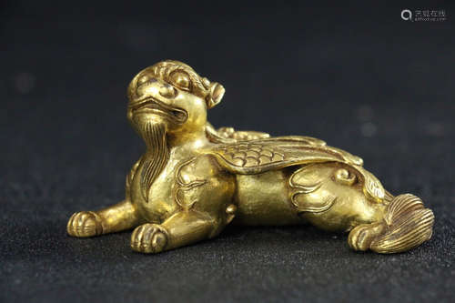 AN OLD  GILT BRONZE PAPERWEIGHT