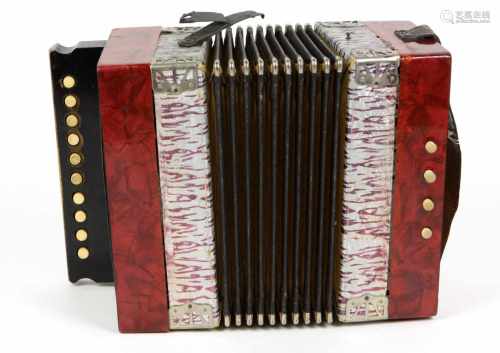 kleine Knopfharmonikarotmarmorierter Holzkorpus, intakter Balg, 10 Melodieknöpfe sowie 4