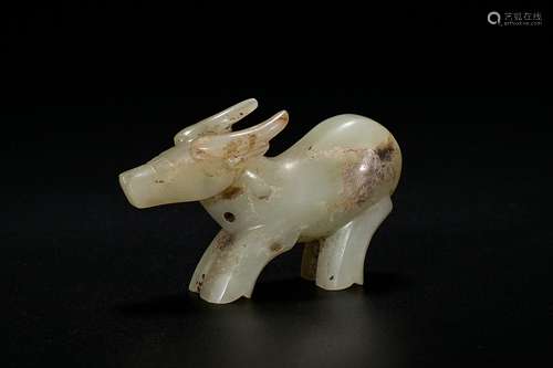 A Celadon Jade Water Buffalo Pendant