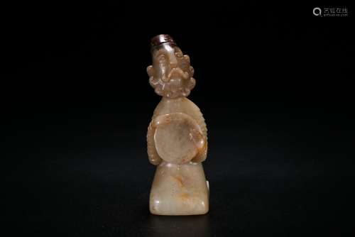 A White Jade Carving of Figure Playing A Drum