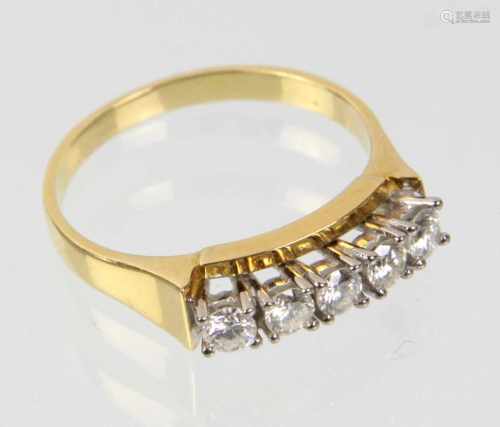 Brillant Ring - GG 750in Gelbgold 750 (18 Karat) gearbeitet u. punziert, Brückenring mit 5 Diamanten
