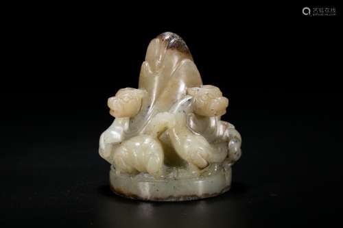 A Jade Carving of Three Dragons on A 'Bamboo Shoot'