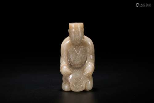 A Jade Carving of A Kneeling Figure