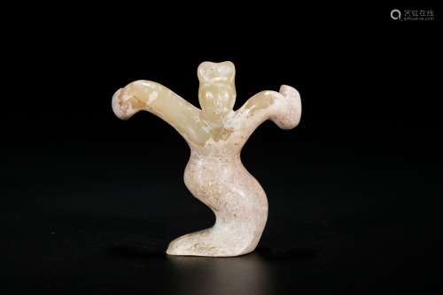 An Archaic Jade of A Dancing Figure