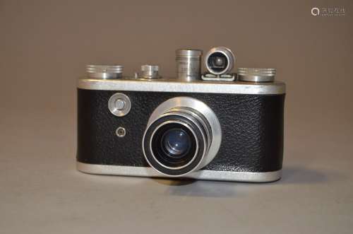 A Corfield Periflex 1 35mm Camera, top and bottom plates chrome colour, shutter not working, body