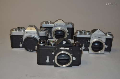 A Group of Nikkormat and a Nikon F SLR Bodies, a black Nikon F, serial no 6951635, shutter