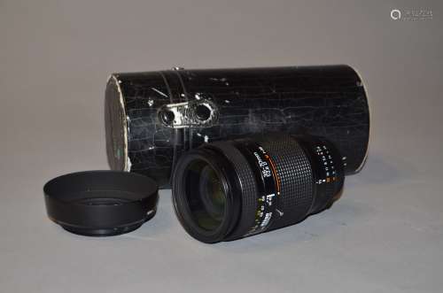 An AF-Nikkor 35-70mm f/2.8 D zoom lens, serial no 784268, condition VG with Nikon HN-22 lens hood,