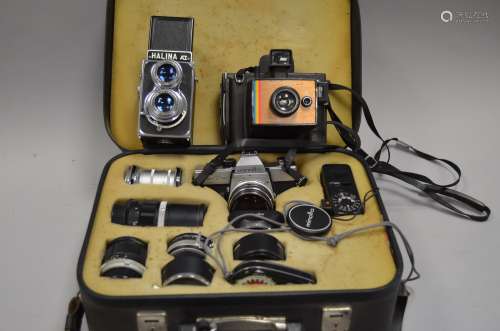 A Minolta SRT101 SLR Outfit, serial no 1011757, condition G, wind lever jammed with Rokkor 35mm f/