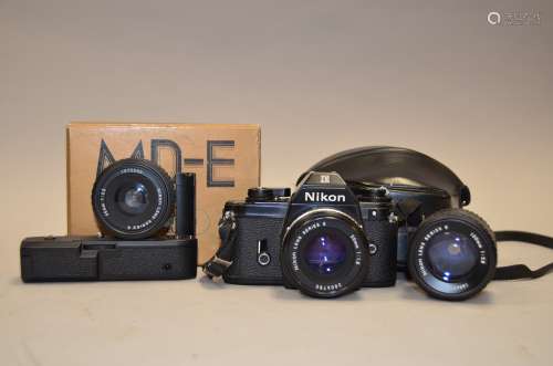 A Nikon EM SLR Camera Outfit, serial no 6974109, shutter working, with three Nikon Series E