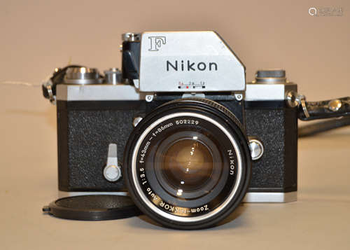 A Nikon F Photomic FTn SLR Camera, chrome, serial no 7213700, body F, brassing on side of lens