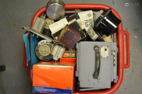 A Tray of Darkroom and Camera Equipment and Parts, including Paterson Tanks, photo paper, film,