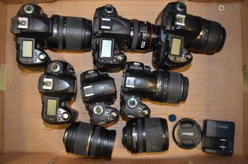 A Tray of Nikon DSLR Cameras with Zoom Lenses, including D60, D70 (2 examples and 1 body only), D90,