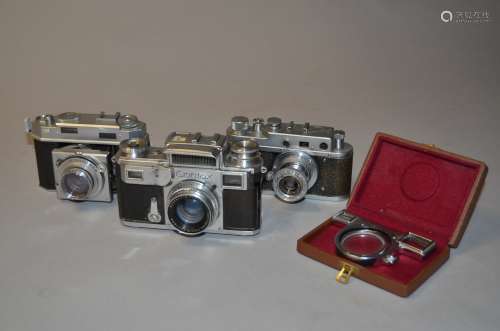 Three 35mm Rangefinder Cameras, a Zeiss Ikon Contax III, serial no E 35830, shutter stuck open,